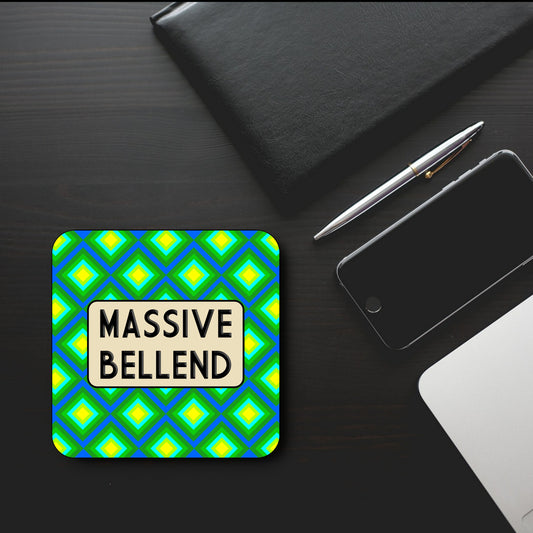 A square coaster with a geometric pattern in green and blue colors, with the text 'MASSIVE BELLEND' in the center.