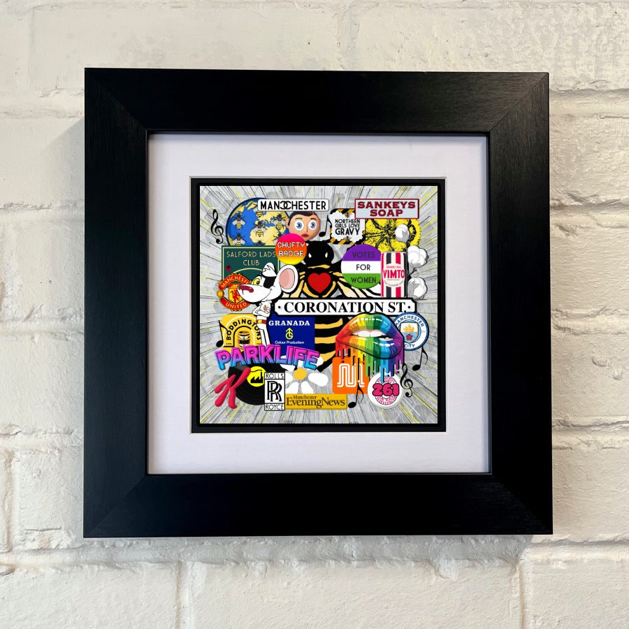A framed print featuring colorful, cartoon-style illustrations of Manchester icons, displayed against a white wall. SU MACE GIFTS