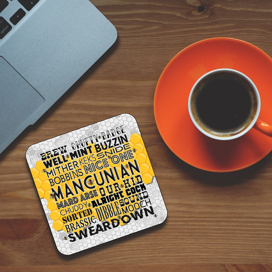 SQUARE MANCUNIAN SLANG COASTER WITH YELLOW AND GREY HONEYCOMB BACKGROUND