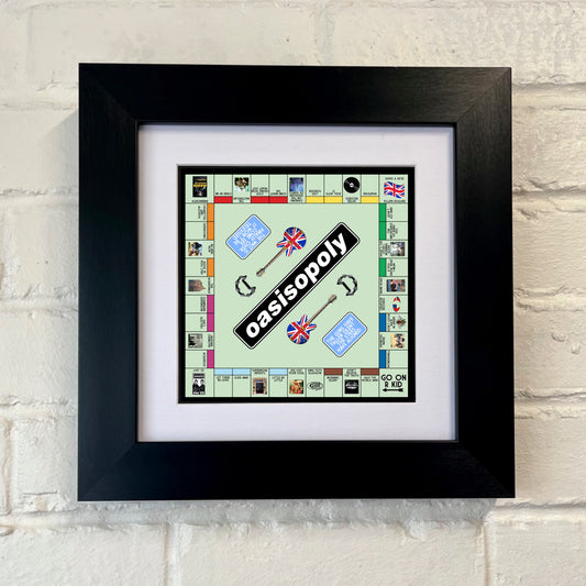 Framed Oasis monopoly board game piece on a textured wall SU MACE GIFTS