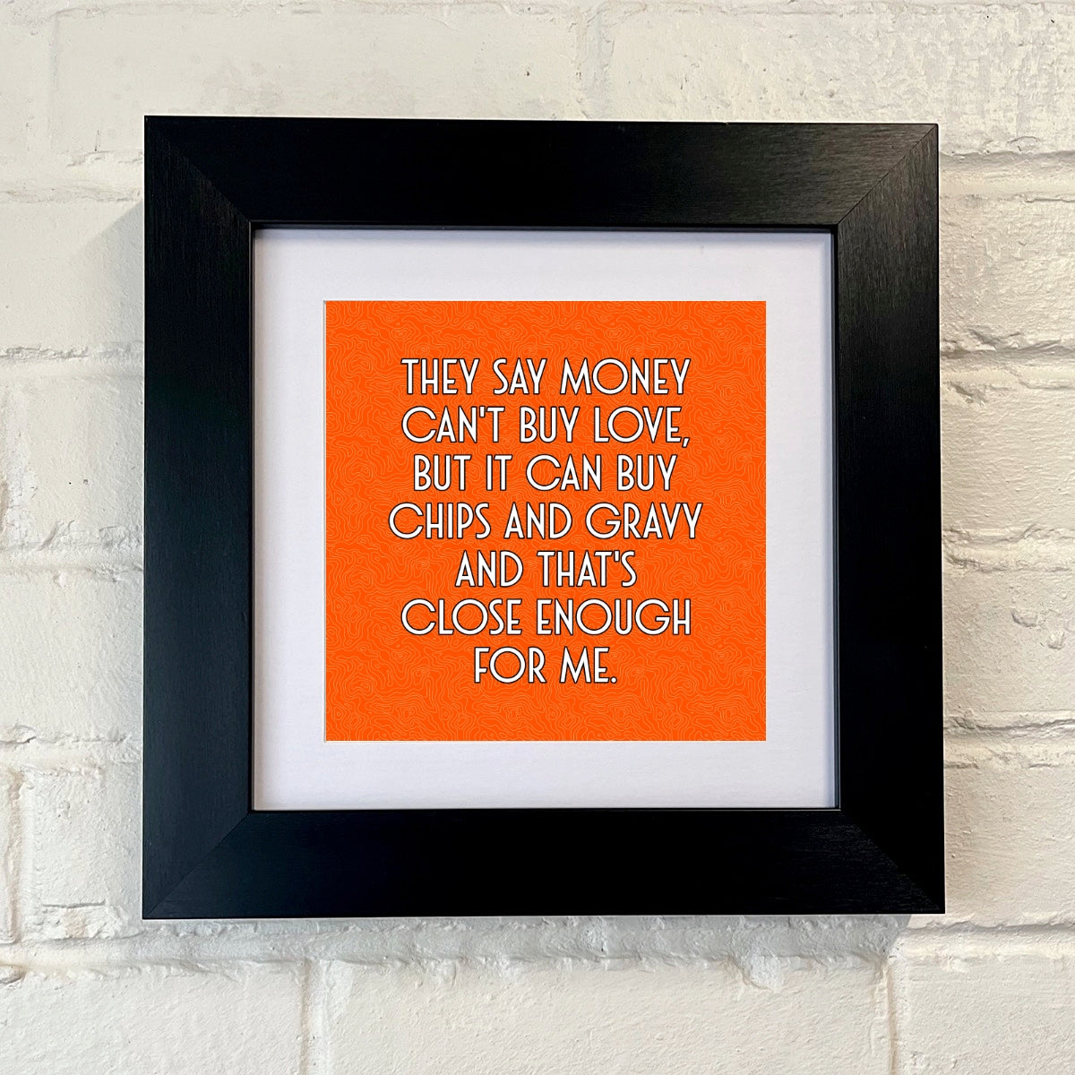 MONEY CAN'T BUY LOVE FRAMED PRINT ON ORANGE BACKGROUND SU MACE GIFTS