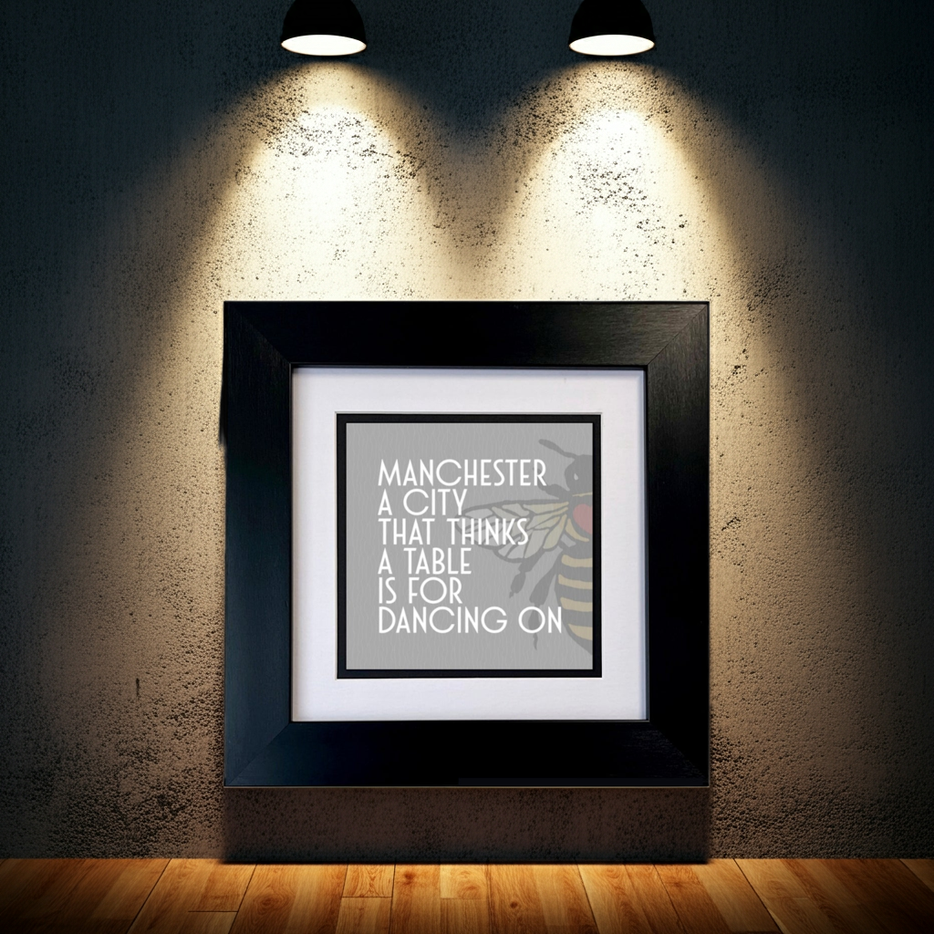 MANCHESTER A CITY THAT THINKS A TABLE IS FOR DANCING ON FRAMED PRINT