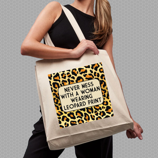 NEVER MESS WITH A WOMAN WEARING LEOPARD PRINT PREMIUM TOTE BAG