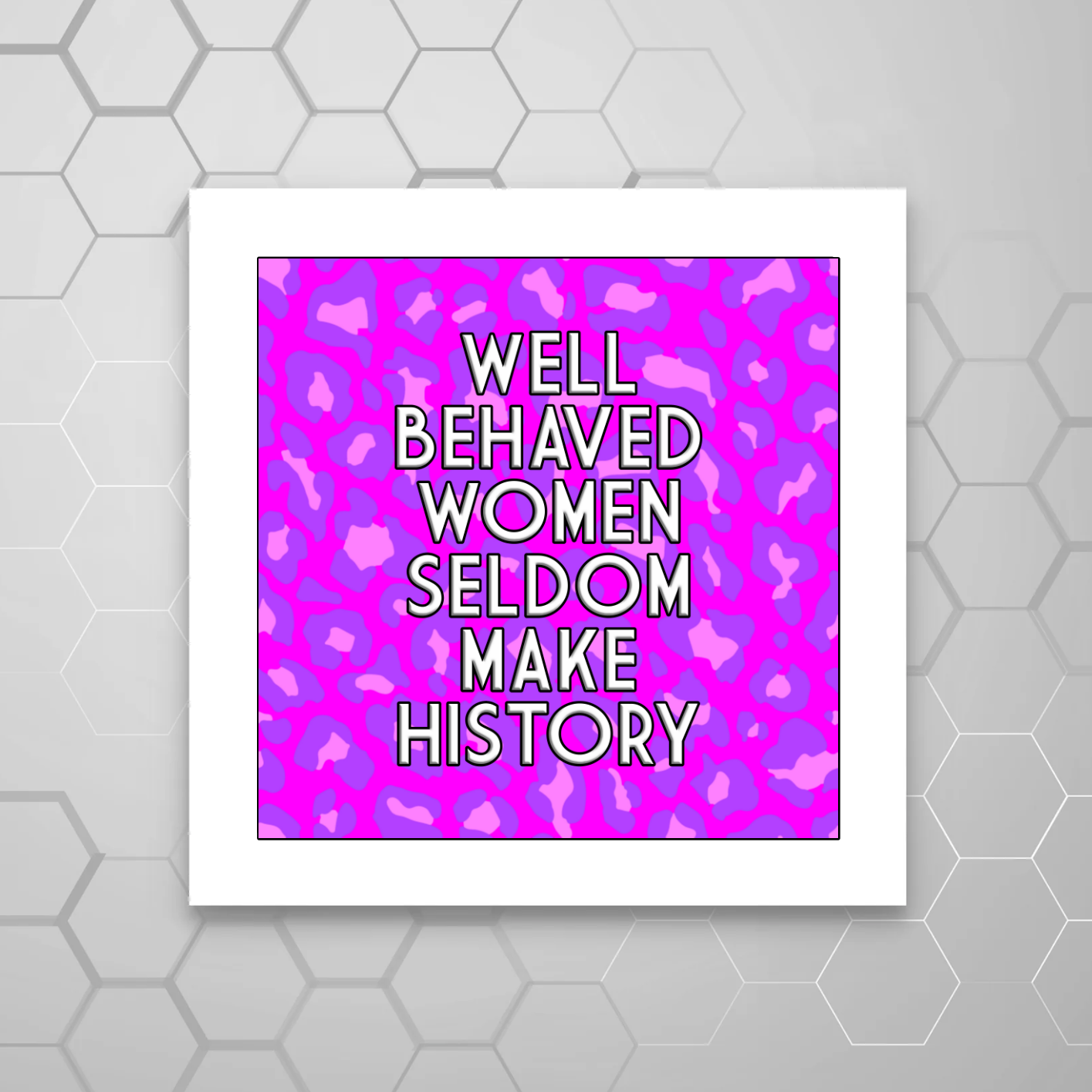 WELL BEHAVED WOMEN SELDOM MAKE HISTORY MOUNTED PRINT WITH A PINK/PURPLE LEOPARD PRINT BACKGROUND