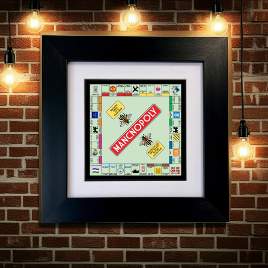 Framed MANCHESTER  Monopoly PRINT on a brick wall with light bulbs. SU MACE GIFTS