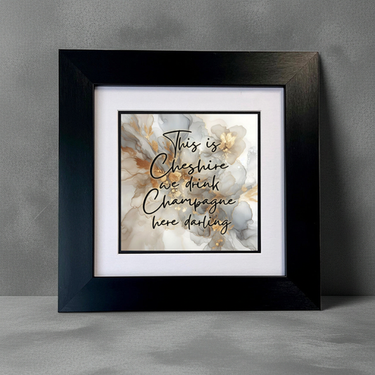 THIS IS CHESHIRE WE DRINK CHAMPAGNE HERE DARLING FRAMED PRINT
