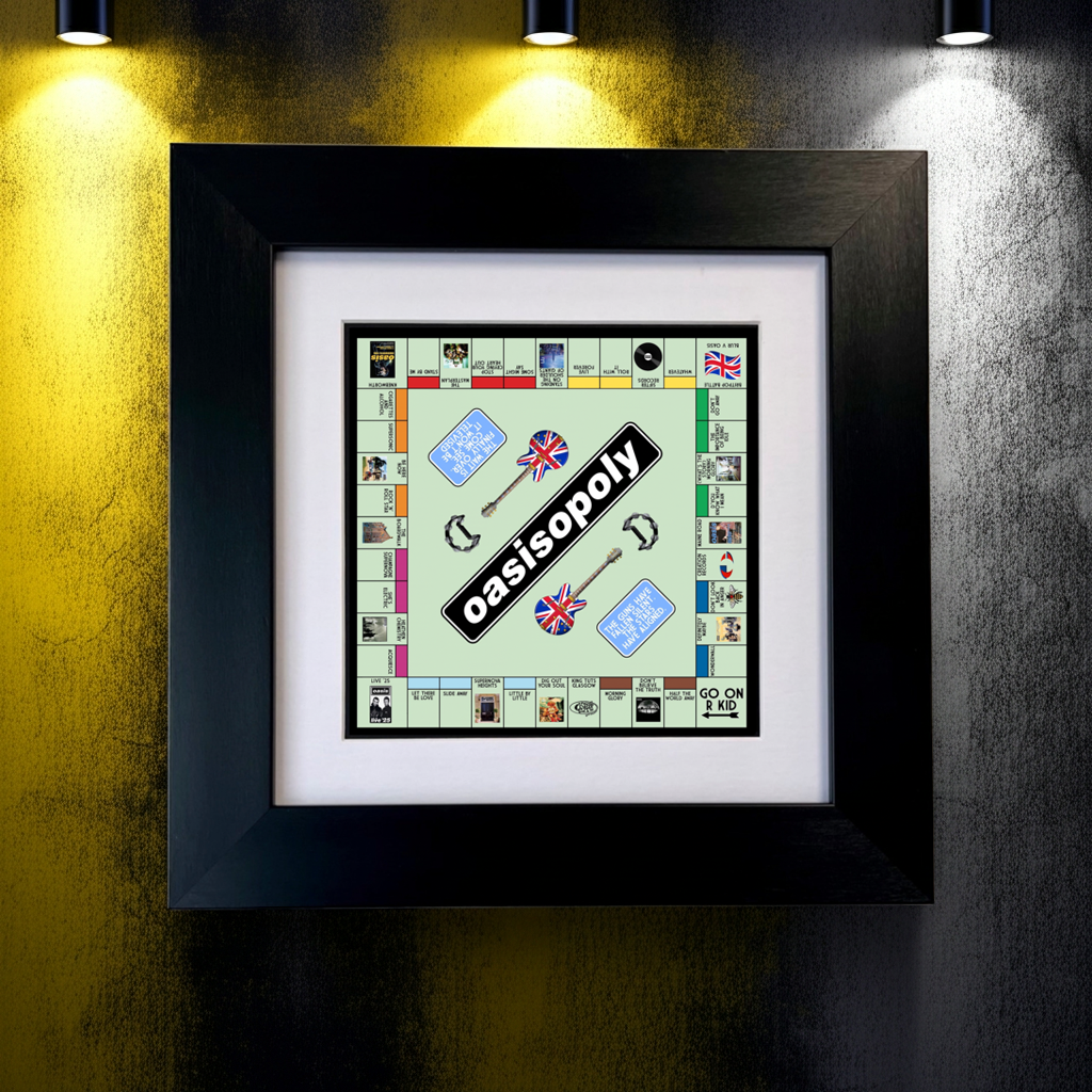 Framed Oasis monopoly board game on a textured wall with lighting SU MACE GIFTS